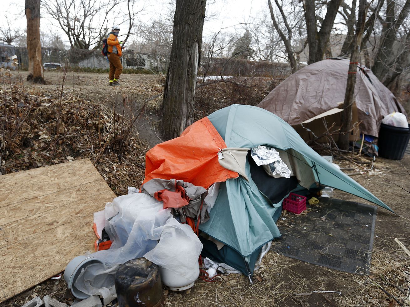 Soren Simonsen, executive director of the Jordan River
Commission, takes down information as to where he is seeing
homeless camps during the 2021 Point-in-Time count, a nationwide
annual event to survey people experiencing unsheltered
homelessness, in Salt Lake City on Thursday, Jan. 28, 2021.
