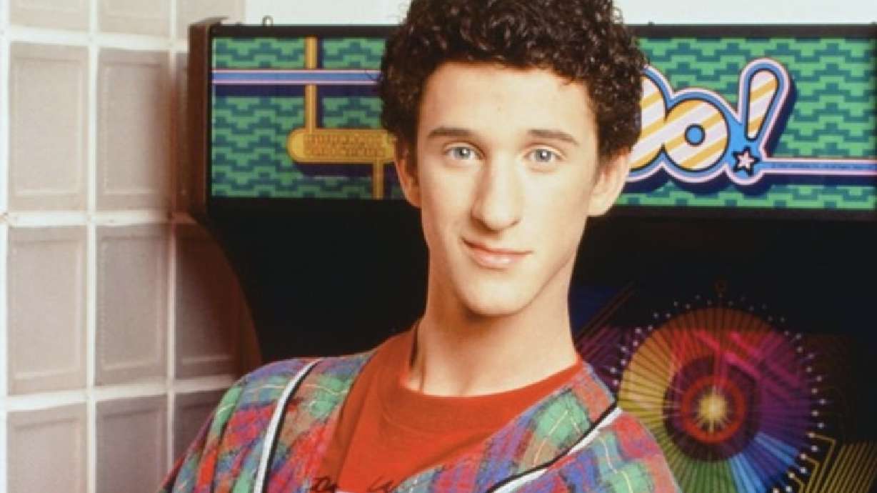 This 1992 image released by NBC shows actor Dustin Diamond as Samuel Powers, better known as Screech" from the series "Saved by the Bell." Diamond died Monday after a three-week fight with carcinoma, according to his representative. He was 44. Diamond was hospitalized last month in Florida and his team disclosed later he had cancer.