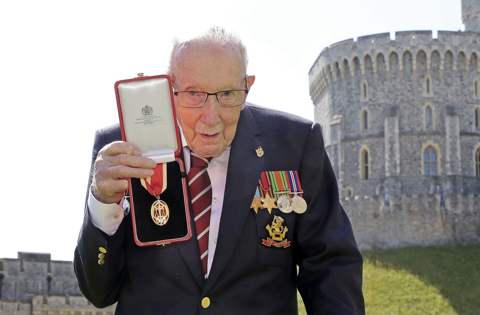 Capt. Tom Moore, UK veteran who walked for NHS, dies at 100