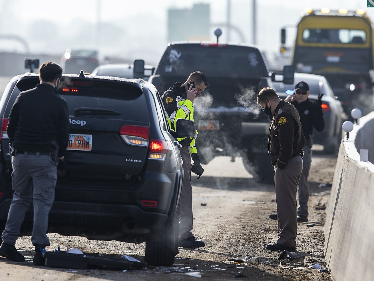 Utah Highway Patrol troopers investigate a road rage
shooting that left two people injured on I-15 in Lehi on Monday,
Jan. 25, 2021.