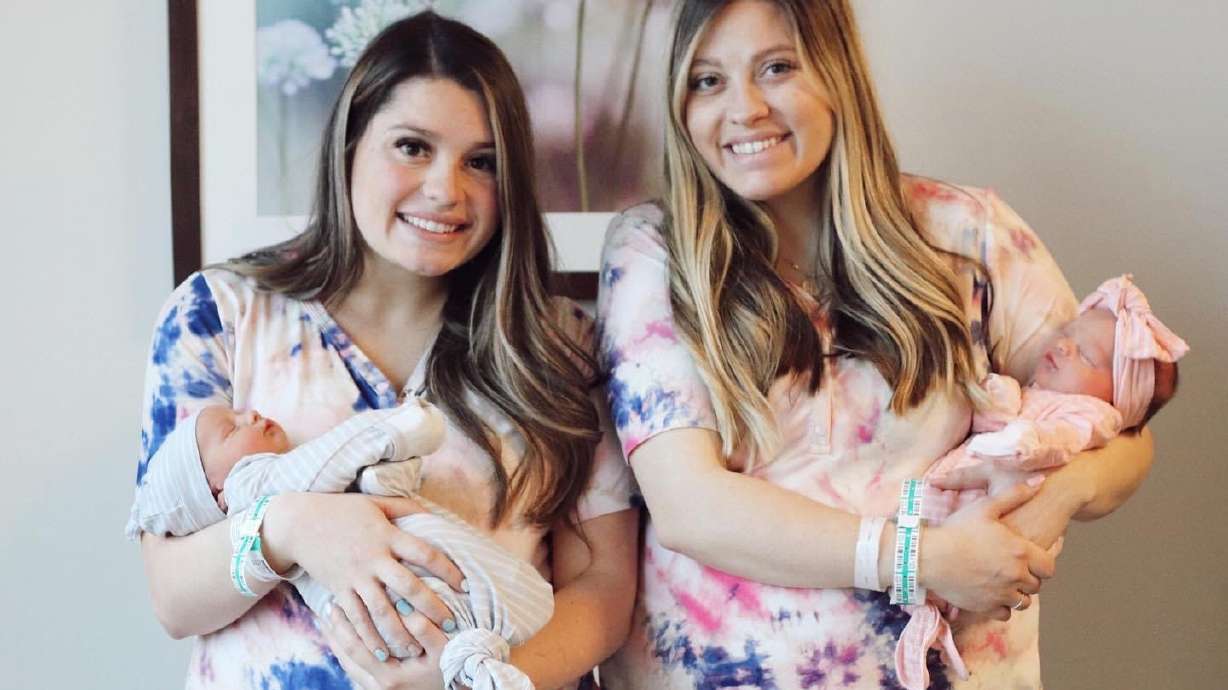 Sisters Paige Smith and Brooke Trowbridge and their babies Grey and Remi.