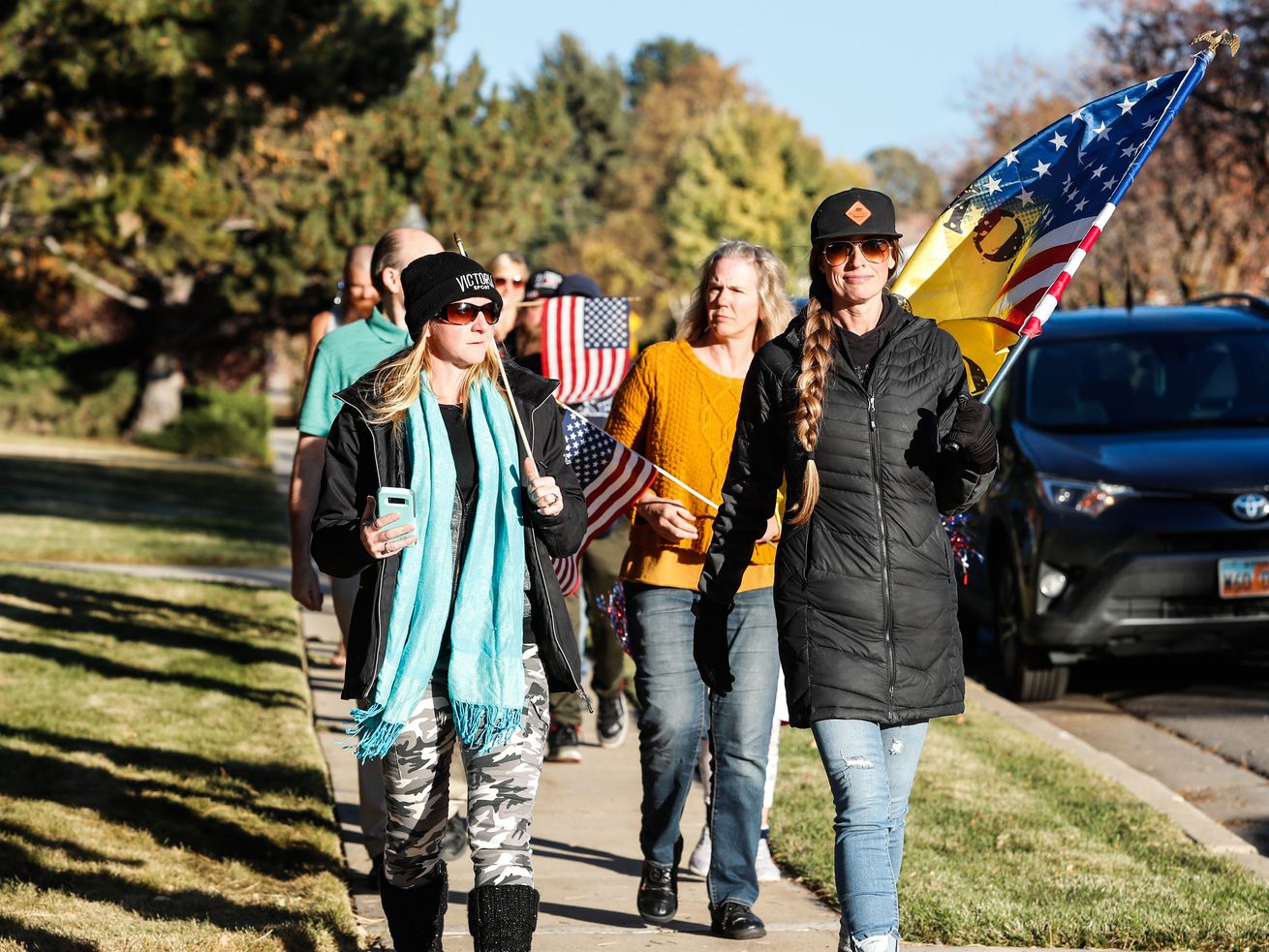 Protesters march toward state epidemiologist Dr.
Angela Dunn’s house during a peaceful protest in Salt Lake City on
Thursday, Oct. 29, 2020.