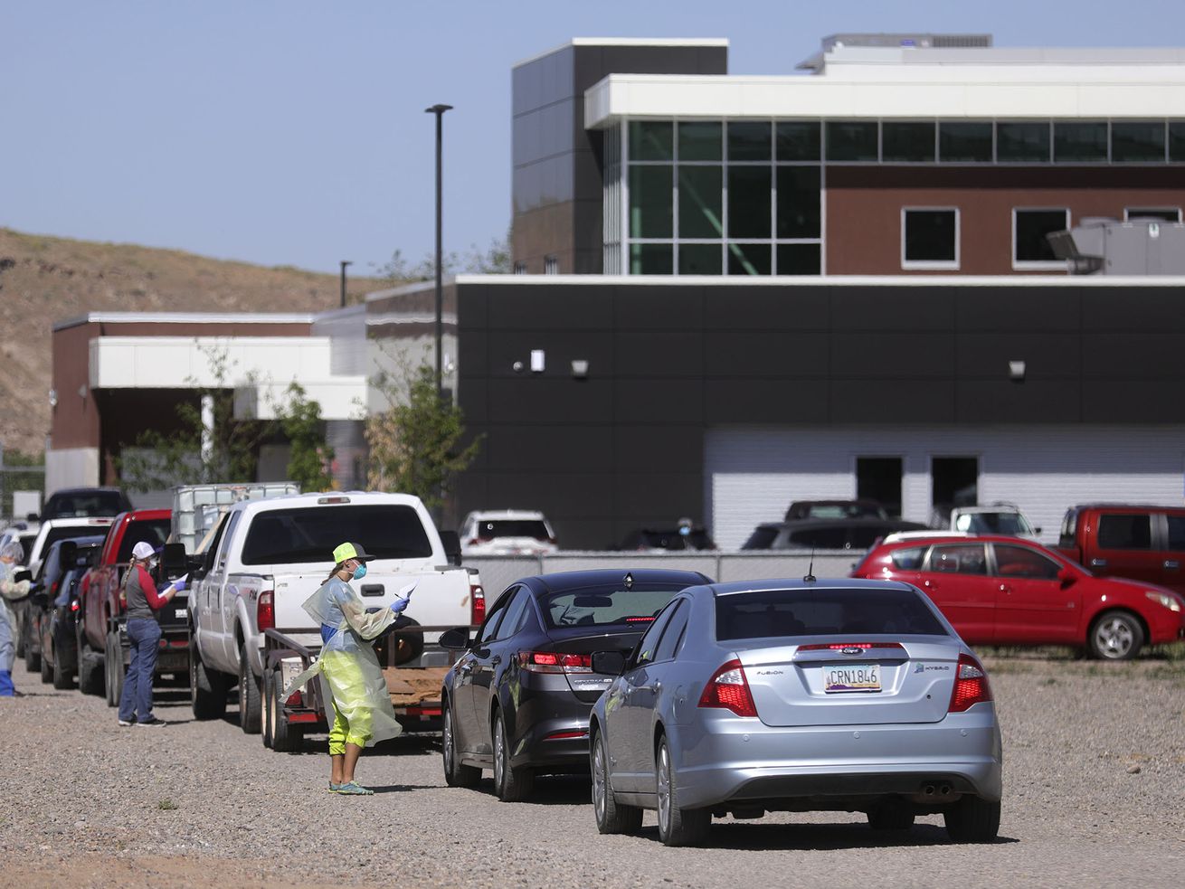 People get tested for COVID-19 outside of the Montezuma
Creek Community Health Center in Montezuma Creek, San Juan County,
on May 1, 2020.