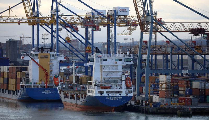FILE PHOTO: Container ships are berthed at the Port of Belfast, Northern Ireland January 2, 2021. REUTERS/Phil Noble/File Photo