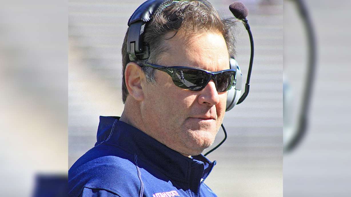 New Utah State defensive coordinator Kevin Clune watches the Aggies' scrimmage Friday afternoon at Romney Stadium.