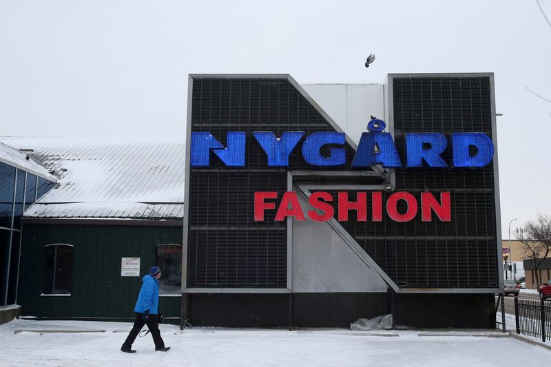FILE PHOTO: The name of fashion executive and designer Peter Nygard is illuminated on a flagship store he once owned in Winnipeg, Manitoba, Canada December 15, 2020. REUTERS/Shannon VanRaes/File Photo