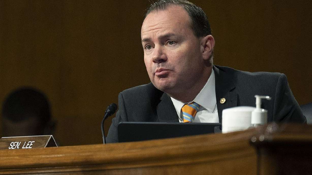 Sen. Mike Lee, R-Utah, questions former Gov. Jennifer
Granholm, D-Mich., as she testifies before the Senate Energy and
Natural Resources Committee during a hearing to examine her
nomination to be secretary of energy on Wednesday, Jan. 27, 2021,
on Capitol Hill in Washington.