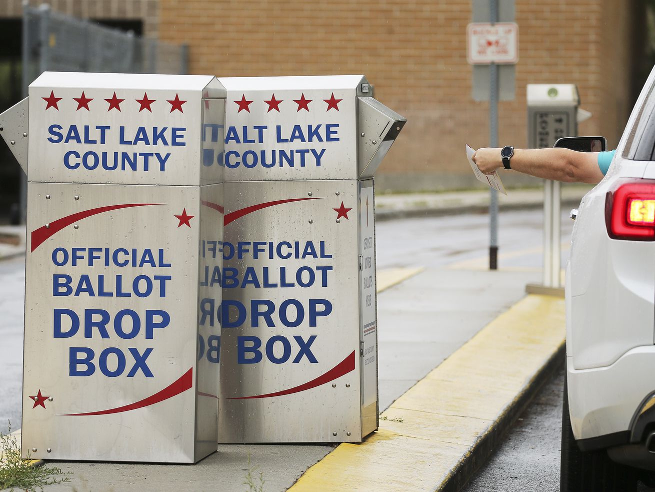 A primary ballot is dropped off at Murray City Hall in
Murray on Tuesday, June 30, 2020.