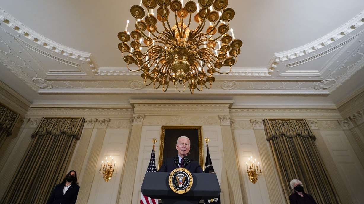 President Joe Biden, accompanied by Vice President Kamala Harris and Treasury Secretary Janet Yellen, speaks about the economy in the State Dinning Room of the White House, Friday, Feb. 5, 2021, in Washington.