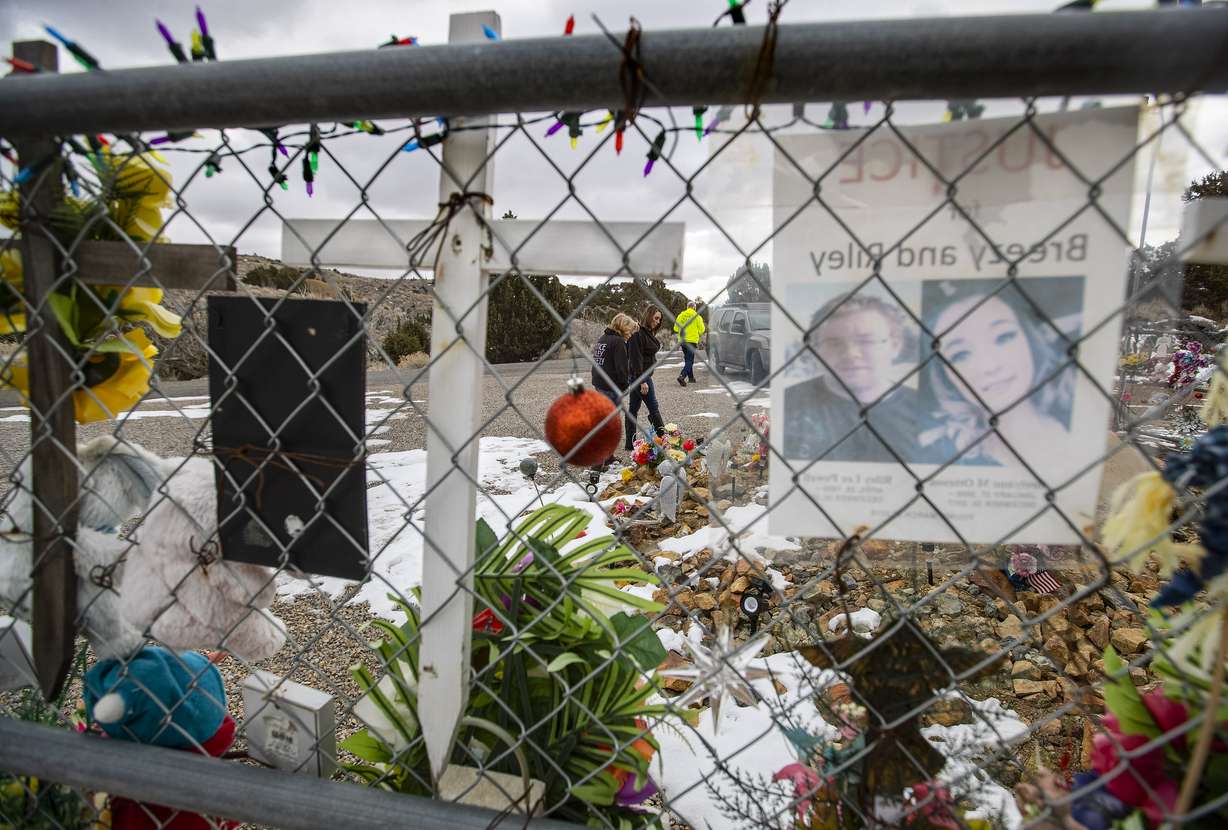 Amanda Hunt, center, visits a permanent memorial for her niece, Brelynne "Breezy" Otteson, and Otteson's boyfriend, Riley Powell, near the Tintic Standard Mine No. 2 near Eureka, Juab County, on Thursday, Feb. 4, 2021. Otteson and Powell were brutally murdered and their bodies were found dumped in the mine shaft in 2018. Davis visited the memorial with Powell's father, Bill Powell, right, and Bill Powell's girlfriend, Debbie Rosenbaum, left. The group visits the memorial regularly to check on it and to see what new items may have been added.