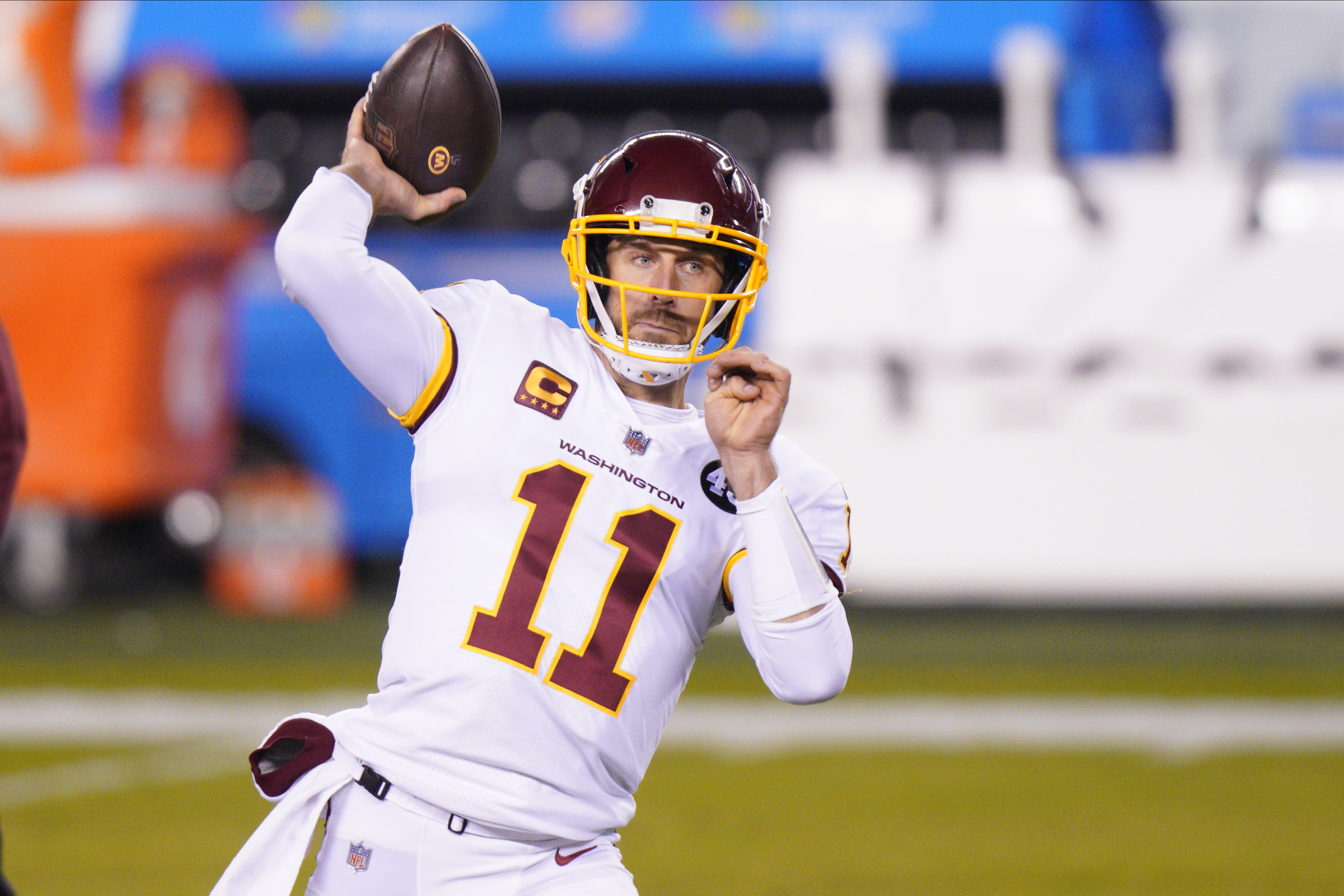 Washington Football Team quarterback Alex Smith warms up before an NFL football game against the Philadelphia Eagles in Philadelphia, in this Sunday, Jan. 3, 2021, file photo. Washington’s biggest offseason need is to figure out its quarterback situation. Trade for DeShaun Watson? Sign Cam Newton? Roll with Alex Smith and Kyle Allen? Coach Ron Rivera says “nothing is off the table.” (Photo: Chris Szagola, Associated Press, File)