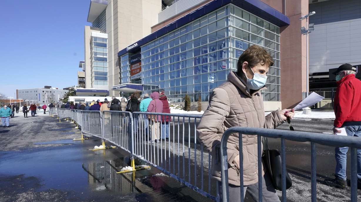 Vaccine drive gains speed, but maskless fans fuel worries