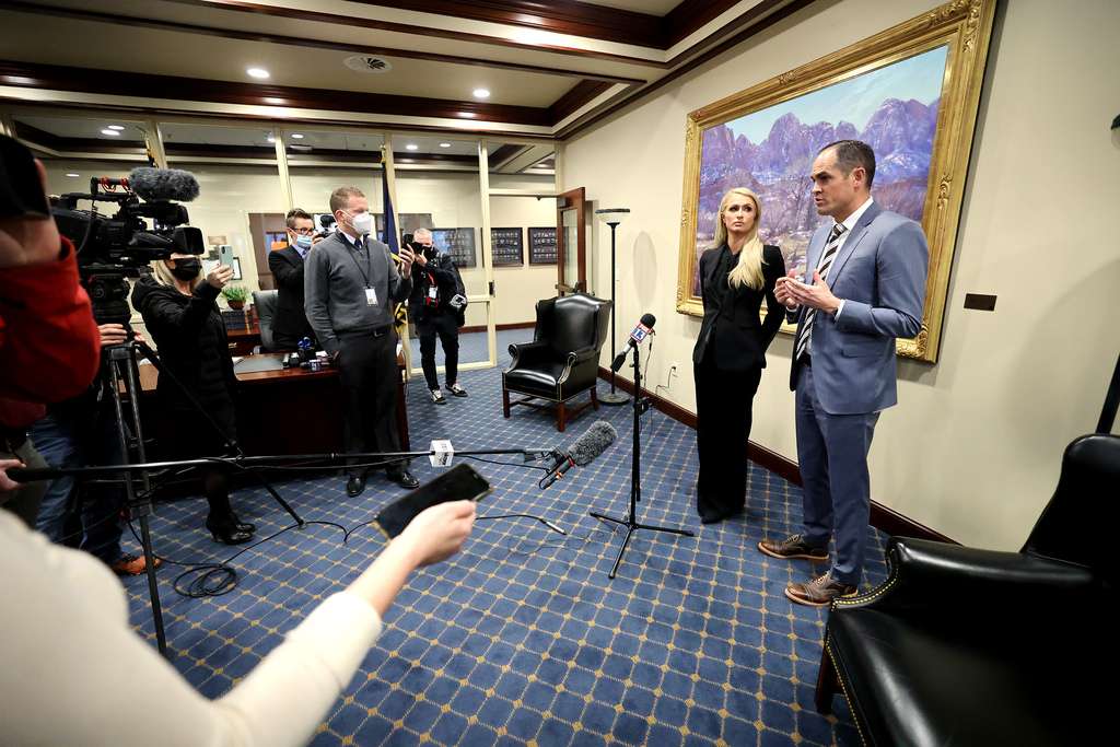 Paris Hilton, stands with Sen. Mike McKell, R-Spanish Fork in a press conference after testifying in the Senate Judiciary, Law Enforcement and Criminal Justice Committee at the Capitol in Salt Lake City for S.B. 127 Human Services Program Amendments on Monday, Feb. 8, 2021.