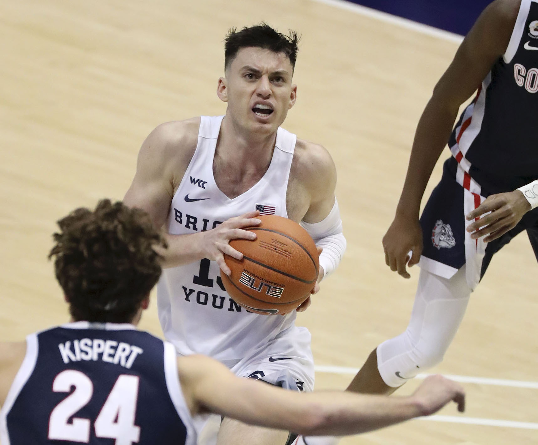 BYU guard Alex Barcello (13) looks to shoot in front of Gonzaga forward Corey Kispert (24) during a basketball game at the Marriott Center in Provo on Monday, Feb. 8, 2021. BYU lost 71-82.