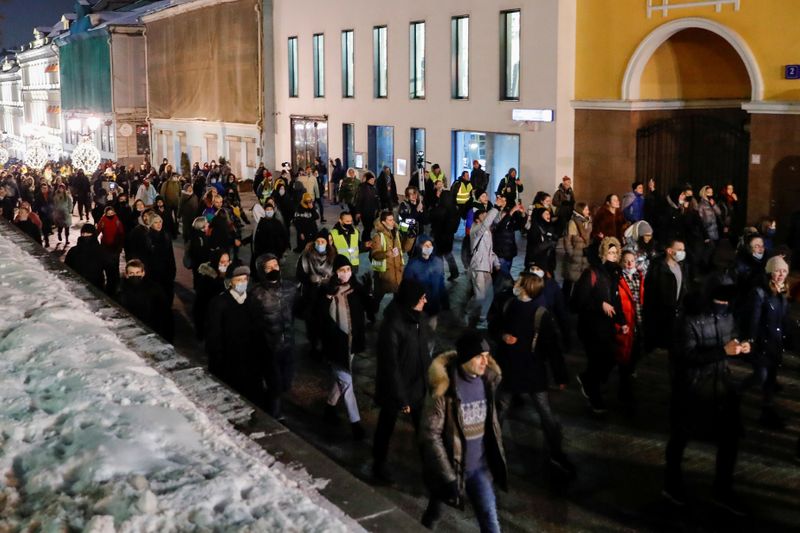 FILE PHOTO: People participate in a demonstration after Russian opposition leader Alexei Navalny was sentenced to three and a half years in jail, in Moscow, Russia February 2, 2021. REUTERS/Evgenia Novozhenina/File Photo