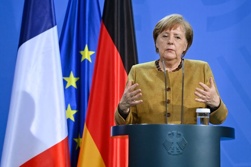 FILE PHOTO: German Chancellor Angela Merkel gives a press conference with French President Emmanuel Macron (not pictured) after German-French Security Council video talks, in Berlin, Germany February 5, 2021. John Macdougall/Pool via REUTERS