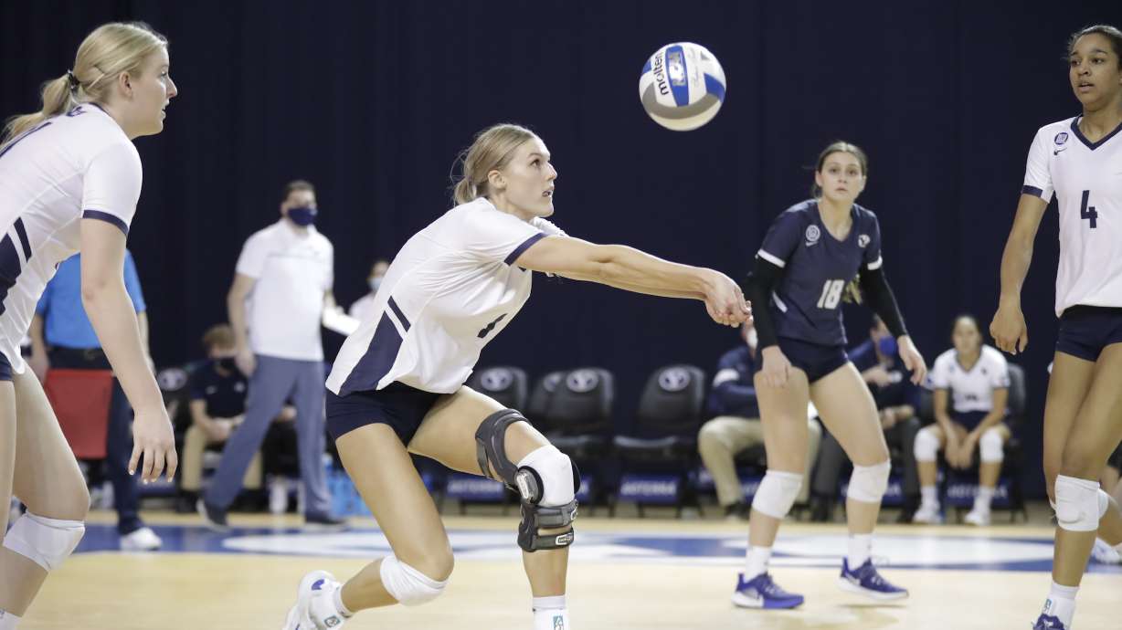 BYU outside hitter Taylen Ballard-Nixon goes for a dig against Gonzaga in the Cougars' home opener, Tuesday, Feb. 9, 2021 in Provo.