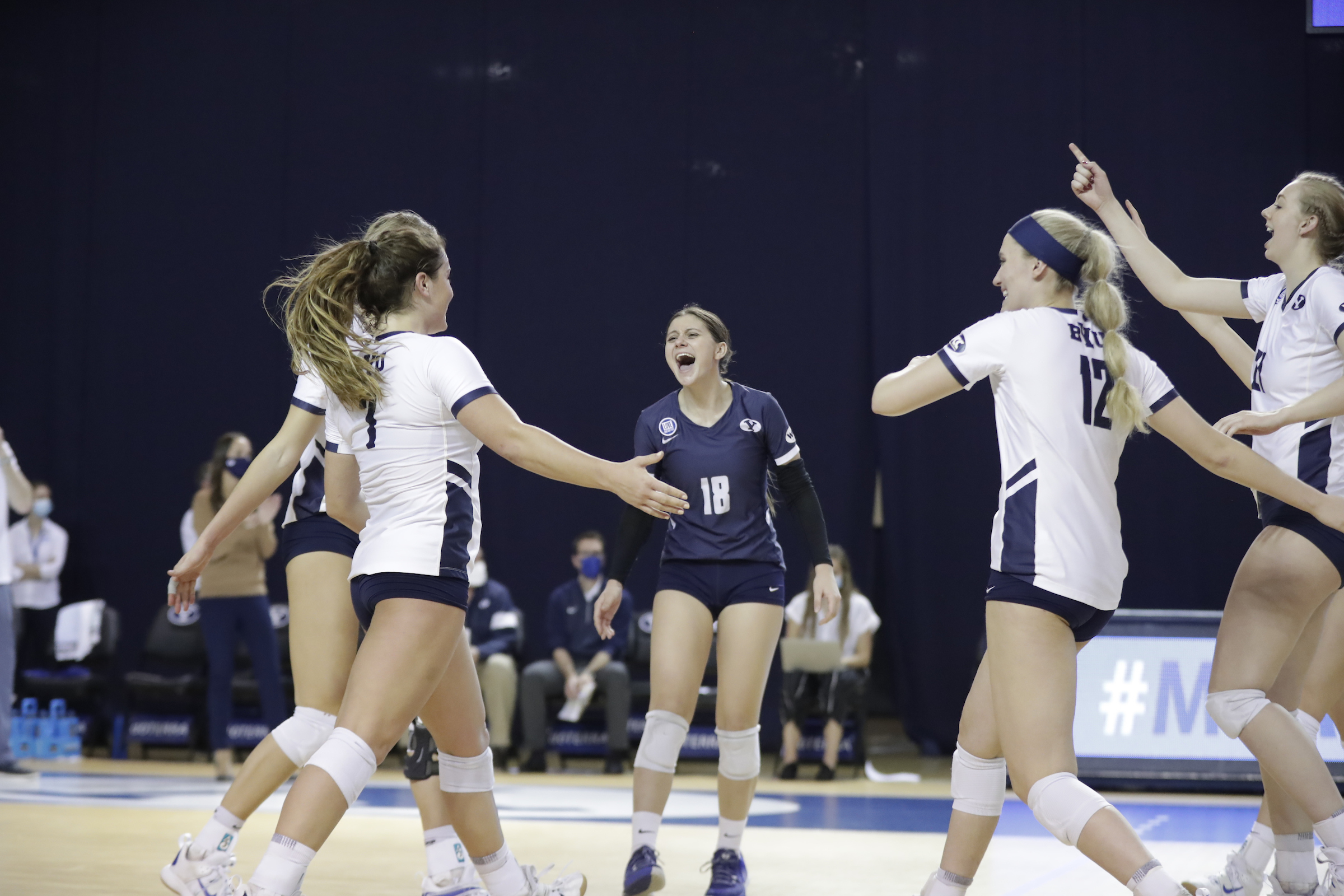 BYU libero Madi Allen, center, celebrates a point against Gonzaga in the Cougars' home opener, Tuesday, Feb. 9, 2021 in Provo.