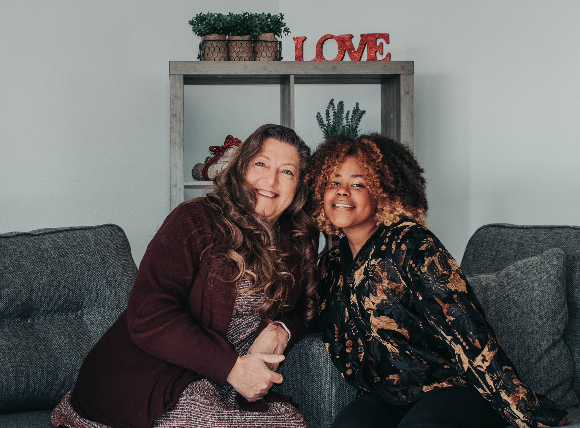 Holly and Tereza Richardson pose for a picture in their home.