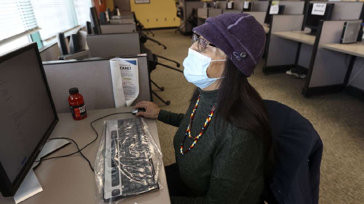 Regina Colorado applies for a job in the Department of
Workforce Services office in Salt Lake City on Friday, Jan. 22,
2021. The state unemployment rate dropped to 3.6%.