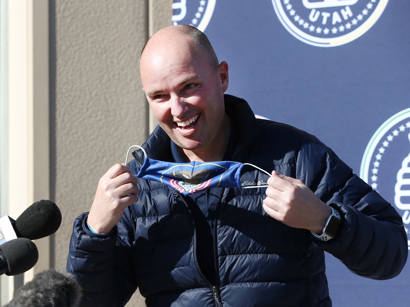 Gov. Spencer Cox takes off his mask as he talks to
members the media at the Utah Food Bank in this Jan. 2, 2021, photo
from St. George, Utah.