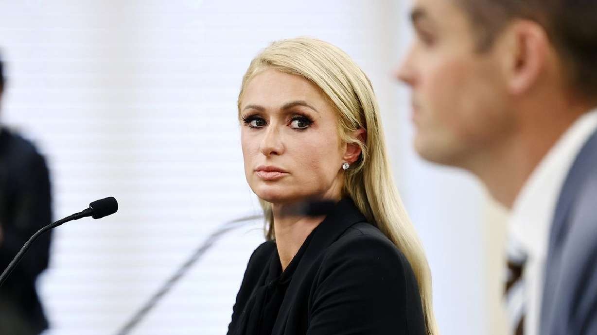Paris Hilton looks over at Sen. Mike McKell, R-Spanish
Fork, as they testify about SB127 before the Senate Judiciary, Law
Enforcement and Criminal Justice Committee at the Capitol in Salt
Lake City on Monday, Feb. 8, 2021. The bill, sponsored by McKell,
would better regulate centers for troubled teens.