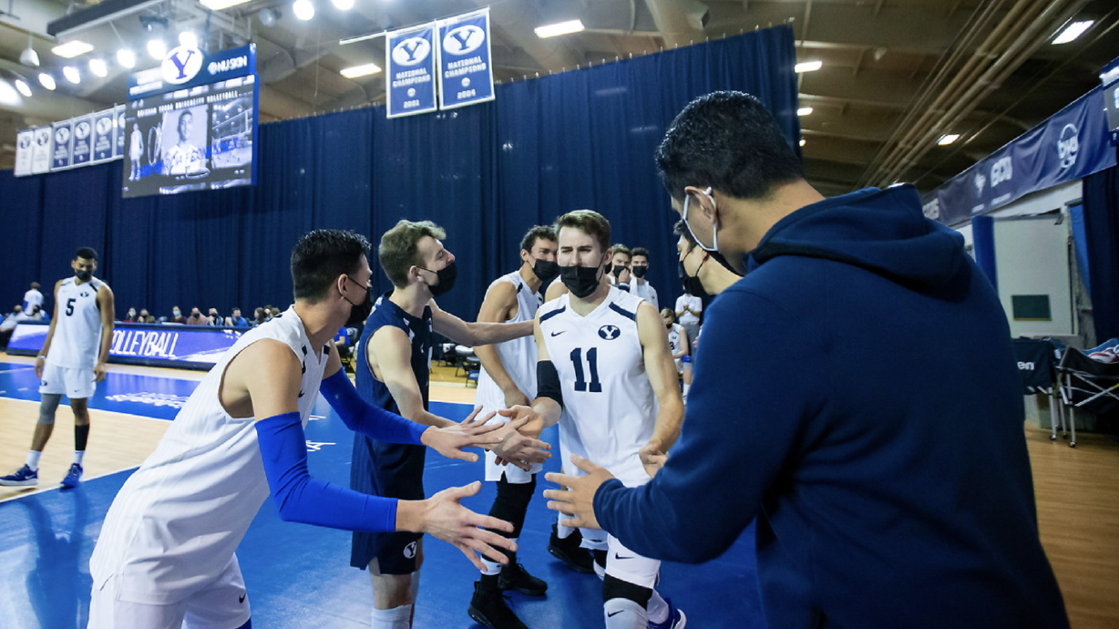 Zach Eschenberg runs out with his teammates before No. 1 BYU men's volleyball hosts UCLA, Feb. 6, 2021 in the Smith Fieldhouse in Provo.