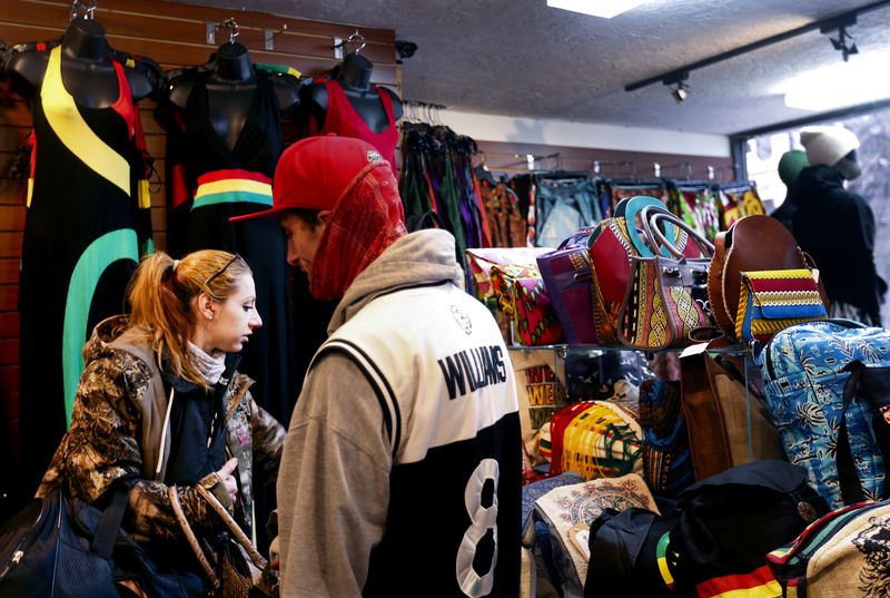 Justine Martinez and Gilbert Symonds shop at Twisted
Roots in Salt Lake City on Friday, Feb. 12, 2021.