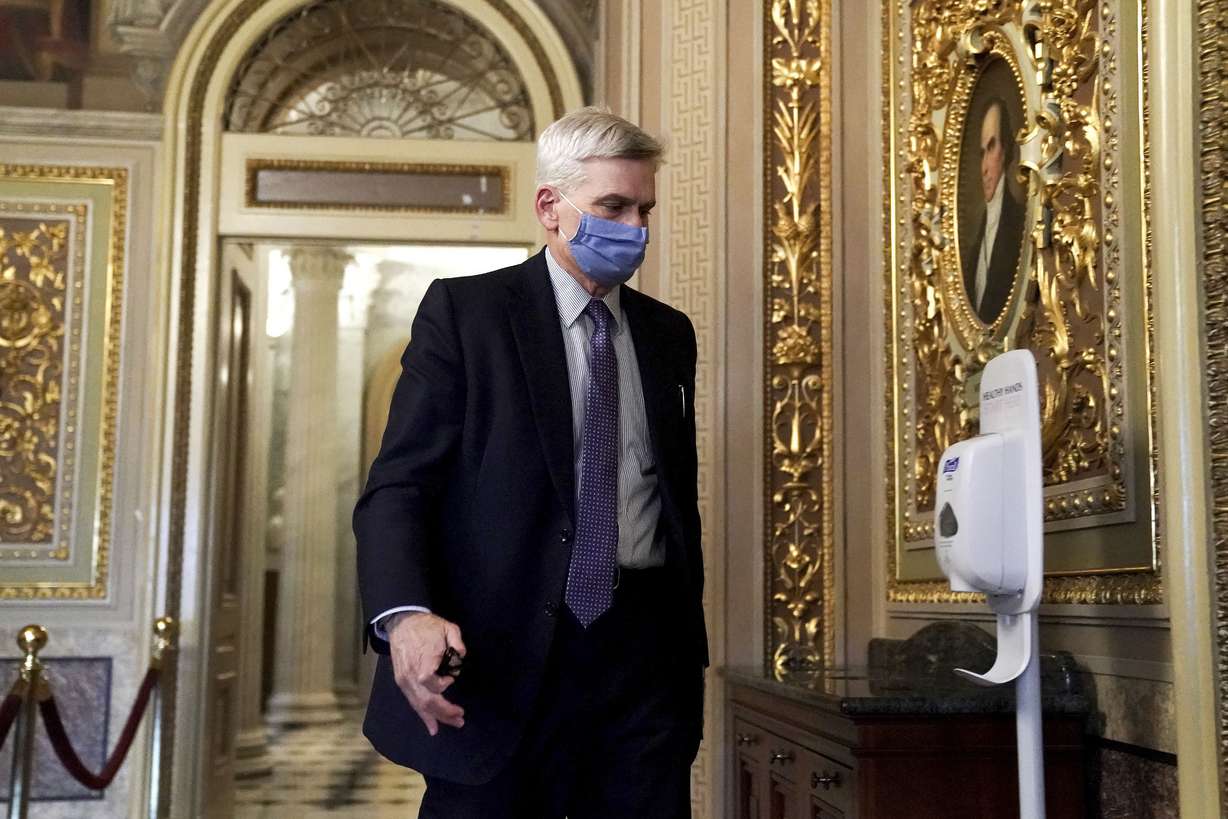 Sen. Bill Cassidy, R-La., walks on Capitol Hill after the Senate acquitted former President Donald Trump in his second impeachment trial in the Senate at the U.S. Capitol in Washington, Saturday, Feb. 13, 2021. Trump was accused of inciting the Jan. 6 attack on the U.S. Capitol, and the acquittal gives him a historic second victory in the court of impeachment.