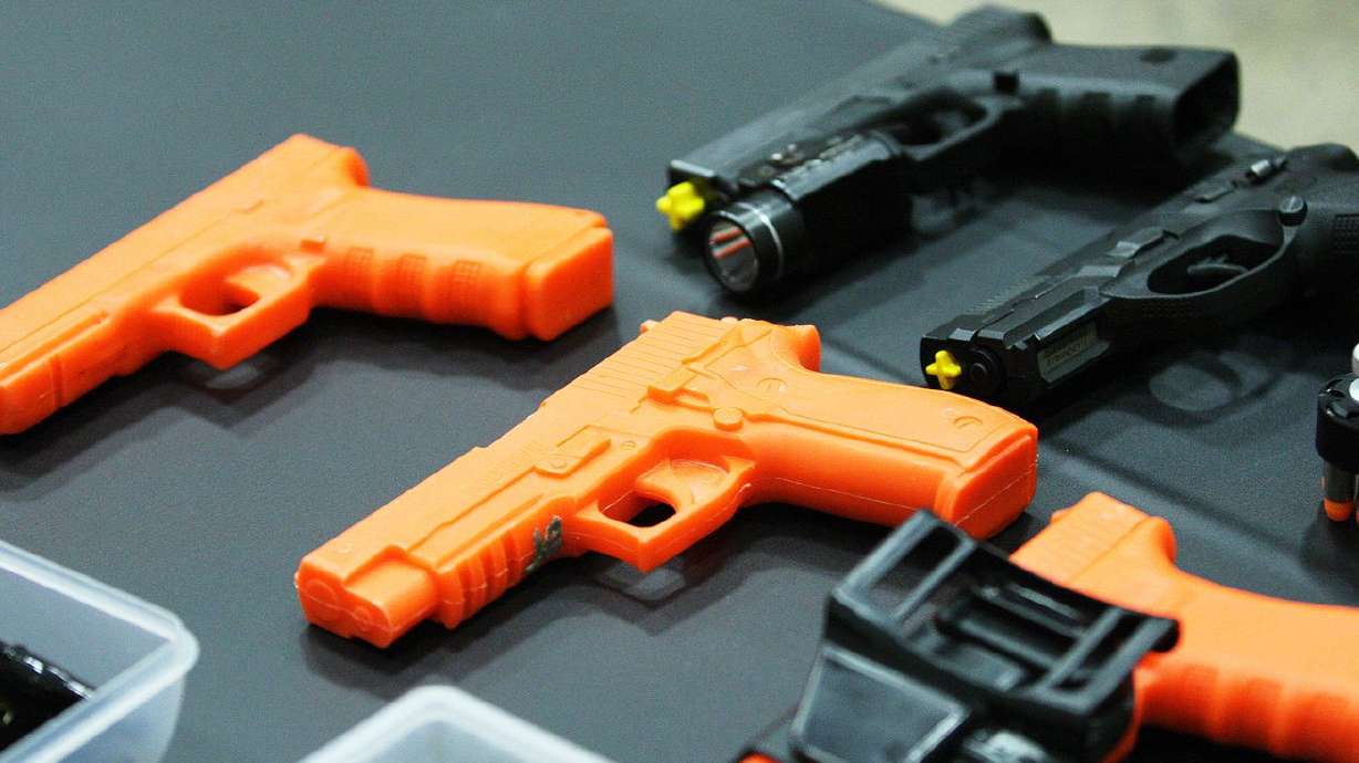 A display is shown at a gun safety and awareness class
at the South Towne Expo Center in Sandy in this Jan. 3, 2015, file
photo.