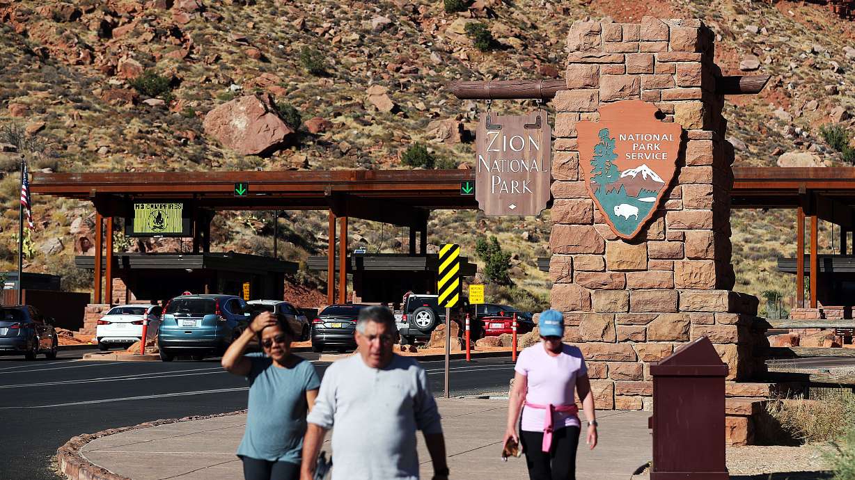 Vehicles enter Zion National Park on Wednesday, Oct. 14, 2020.