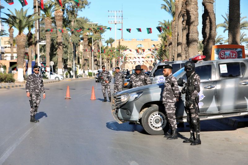 Libyan security force members secure the area ahead of celebrations commemorating the 10th anniversary of the 2011 revolution in Tripoli, Libya February 17, 2021. REUTERS/Hazem Ahmed
