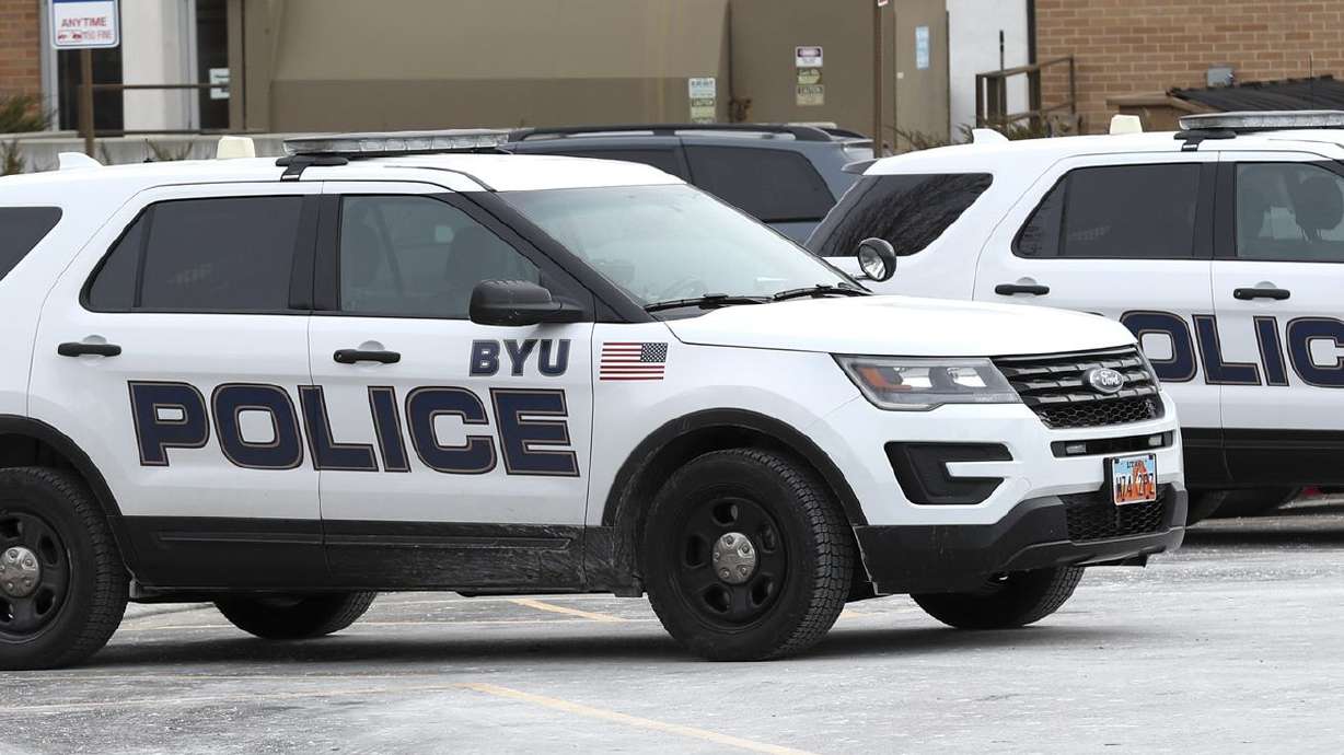 BYU police vehicles are parked outside the department’s
offices on the BYU campus in Provo on Thursday, Feb. 21, 2019.