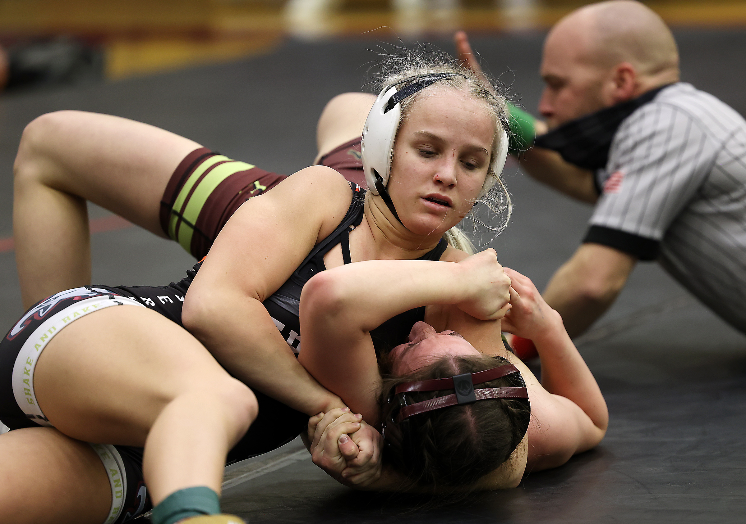 Sage Mortimer of American Leadership Academy pins Donna Wright of Maple Mountain as they wrestle in class 115 at the 5A/3A/2A/1A girls wrestling championship at Mountain View High School in Orem on Wednesday, Feb. 17, 2021.