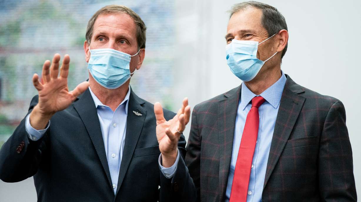 Rep. Chris Stewart, R-Utah, who is in a race to hold onto his 2nd Congressional District Seat, and Rep. John Curtis, R-Utah, who will retain his 3rd Congressional District seat, chat during an election night event for Republican candidates in at the Utah Association of Realtors building in Sandy on Tuesday, Nov. 3, 2020.
