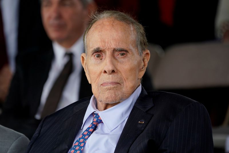 FILE PHOTO: Former Senate majority leader Bob Dole (R-KS) attends a welcome ceremony in honor of new Joint Chiefs of Staff Chairman Army General Mark Milley at Joint Base Myer-Henderson Hall, Virginia, U.S., September 30, 2019. REUTERS/Kevin Lamarque/File Photo