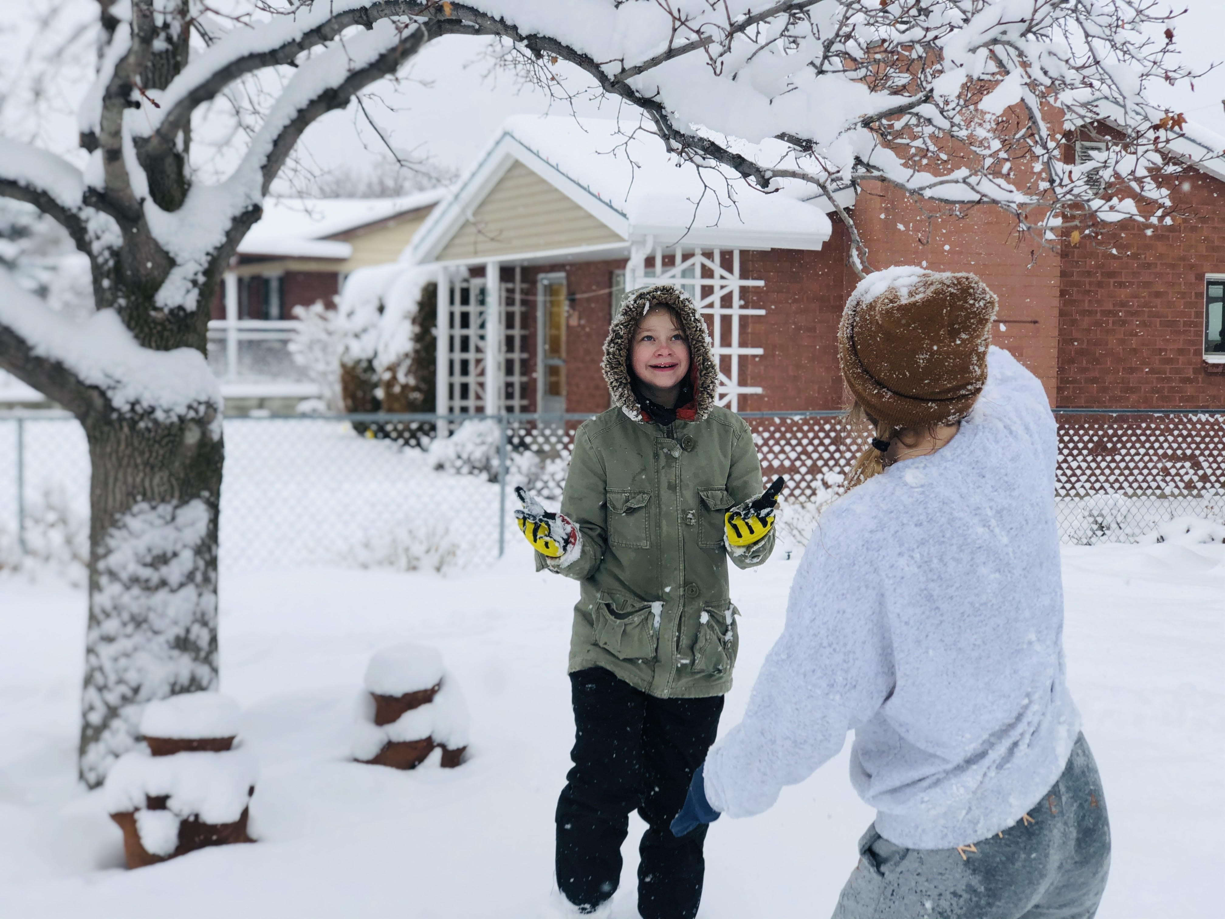Arianne Brown's two daughters play in the snow.