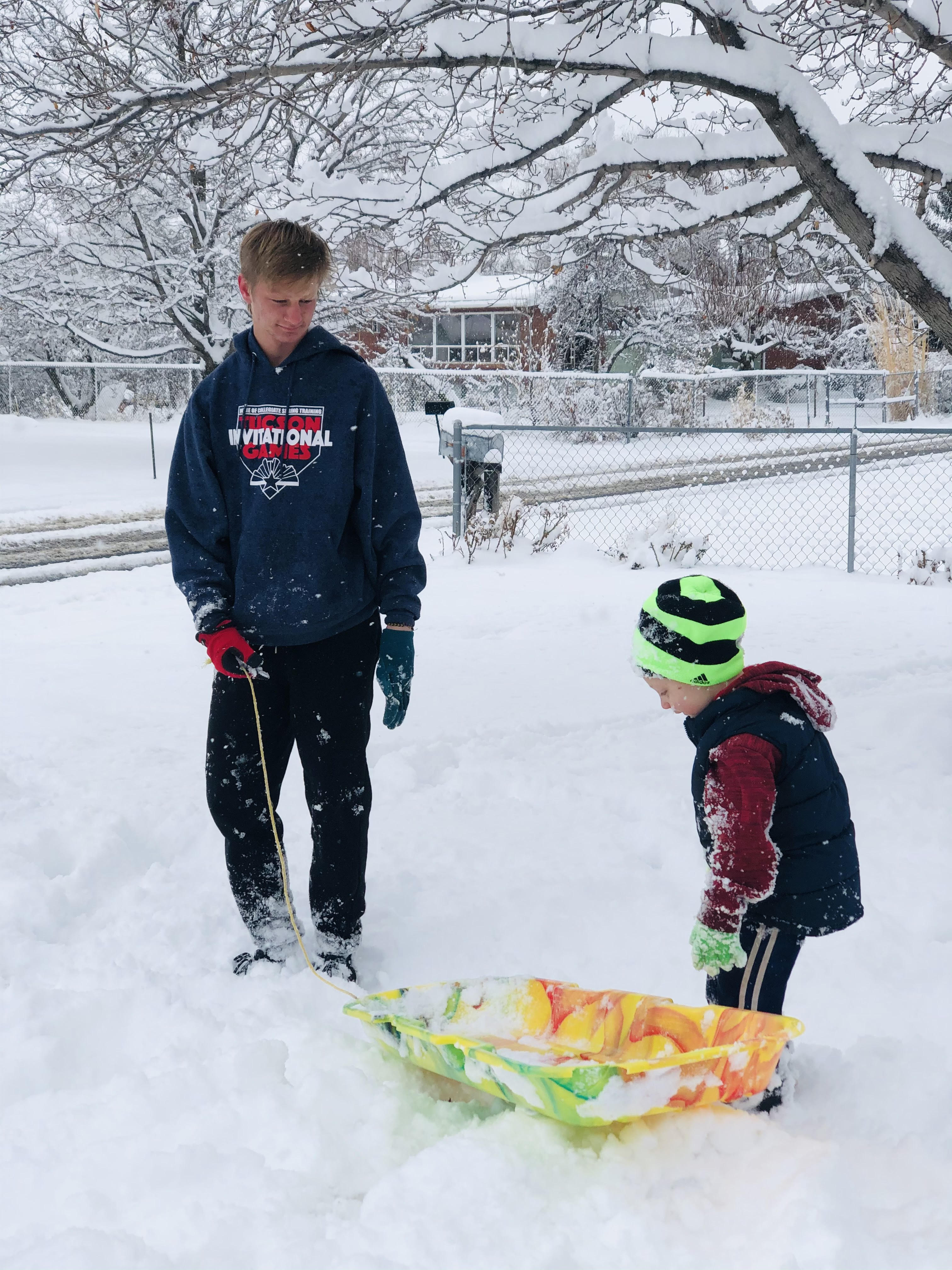 Two of Arianne Brown's sons enjoy time in the snow together during the recent storm.