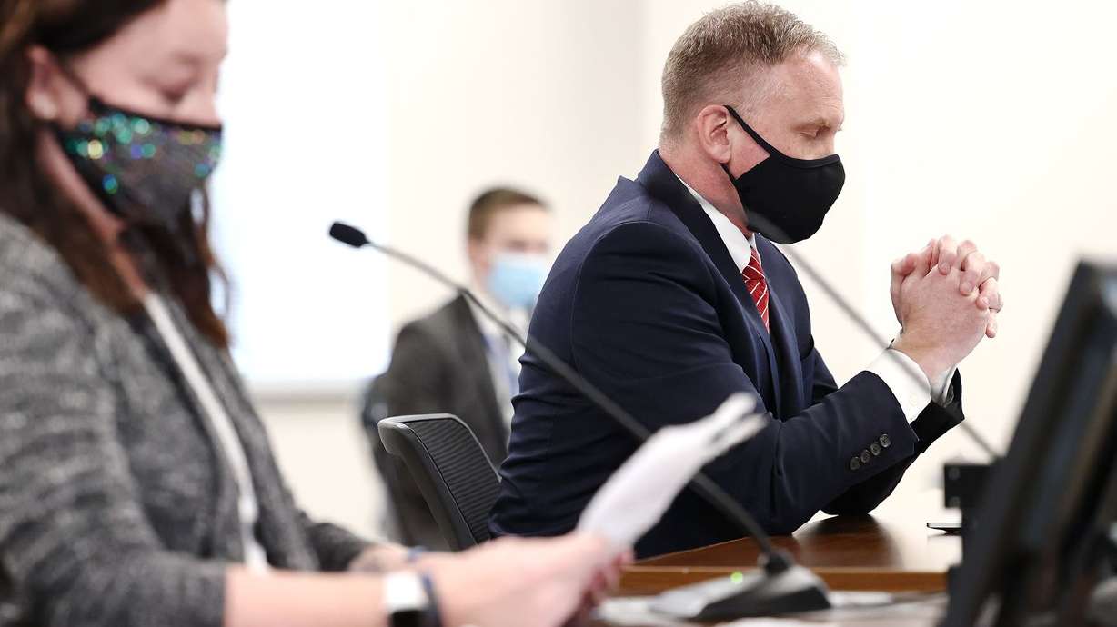Jenny Brotherson, mother of West Valley police officer
Cody Brotherson, who was killed in the line of duty on Nov. 6,
2016, speaks about HB67, sponsored by Rep. Craig Hall, R-West
Valley City, right, before the House Judiciary Standing Committee
at the Capitol in Salt Lake City on Wednesday, Jan. 27, 2021.