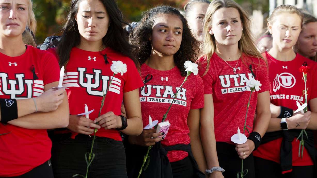 Student athletes and fellow students gather at the
University of Utah for a vigil for Lauren McCluskey on Wednesday,
Oct. 24, 2018. A lawmaker proposed changing a bill inspired by
McCluskey that would allow for prosecution if an officer shares
intimate photos of a victim to those outside of an investigation
even I the victim has died.