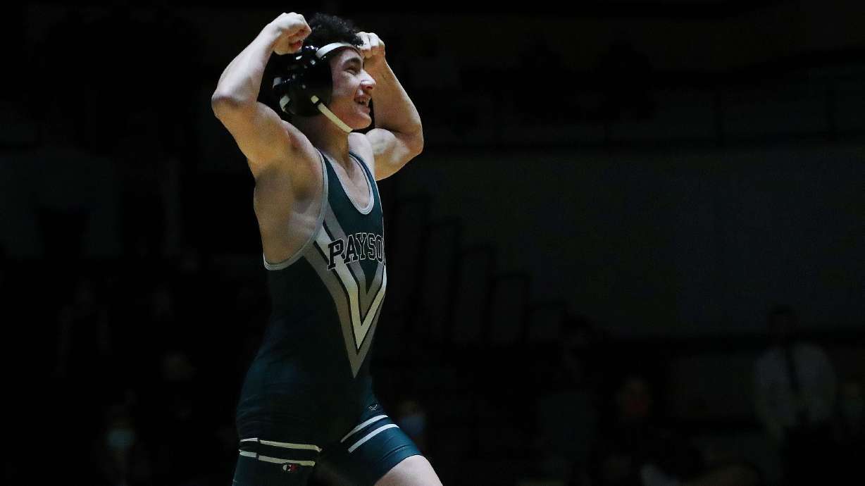 Payson's Aaron Garcia celebrates winning the 106 lb. championship during 5A boys wrestling at Wasatch High in Heber on Thursday, Feb. 18, 2021.