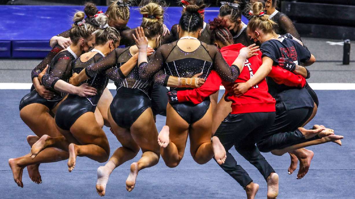 Utah's gymnasts huddle as Utah and UCLA compete in a gymnastics meet at the Huntsman Center in Salt Lake City on Friday, Feb. 19, 2021.