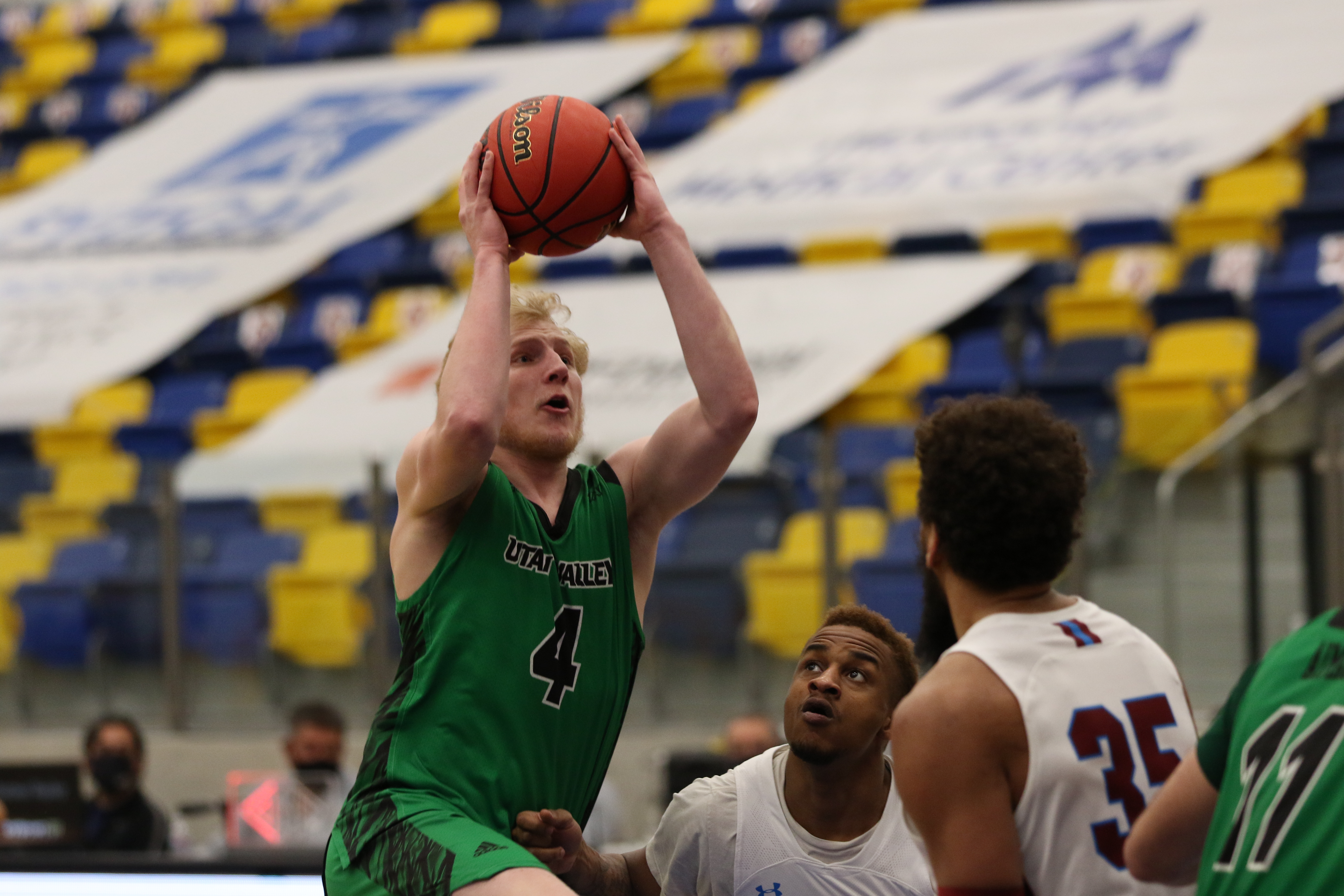 Trey Woodbury dribbles around New Mexico State during UVU's trip to face the Aggies at Eastwood High School in El Paso, Texas.