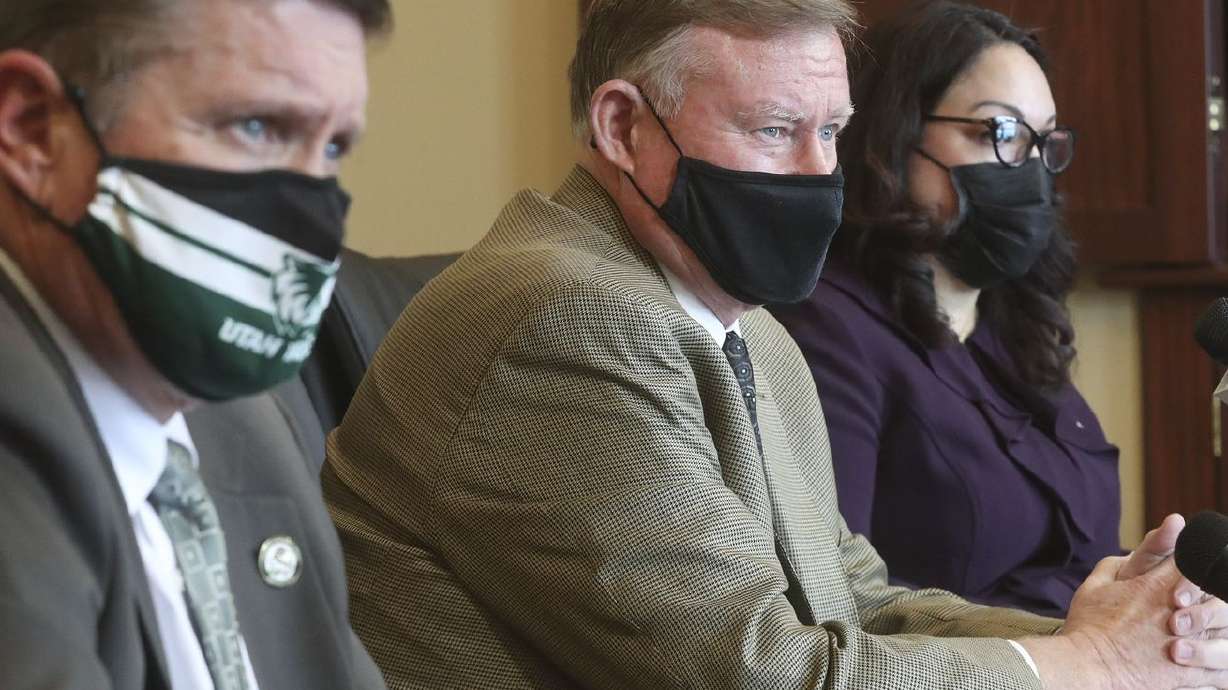Rep. Val Peterson, R-Orem, left, Senate Majority Leader
Evan Vickers, R-Cedar City, and Sen. Luz Escamilla, D-Salt Lake
City, discuss SB195 in the Senate Rules Room at the Capitol in Salt
Lake City on Wednesday, Feb. 17, 2021.