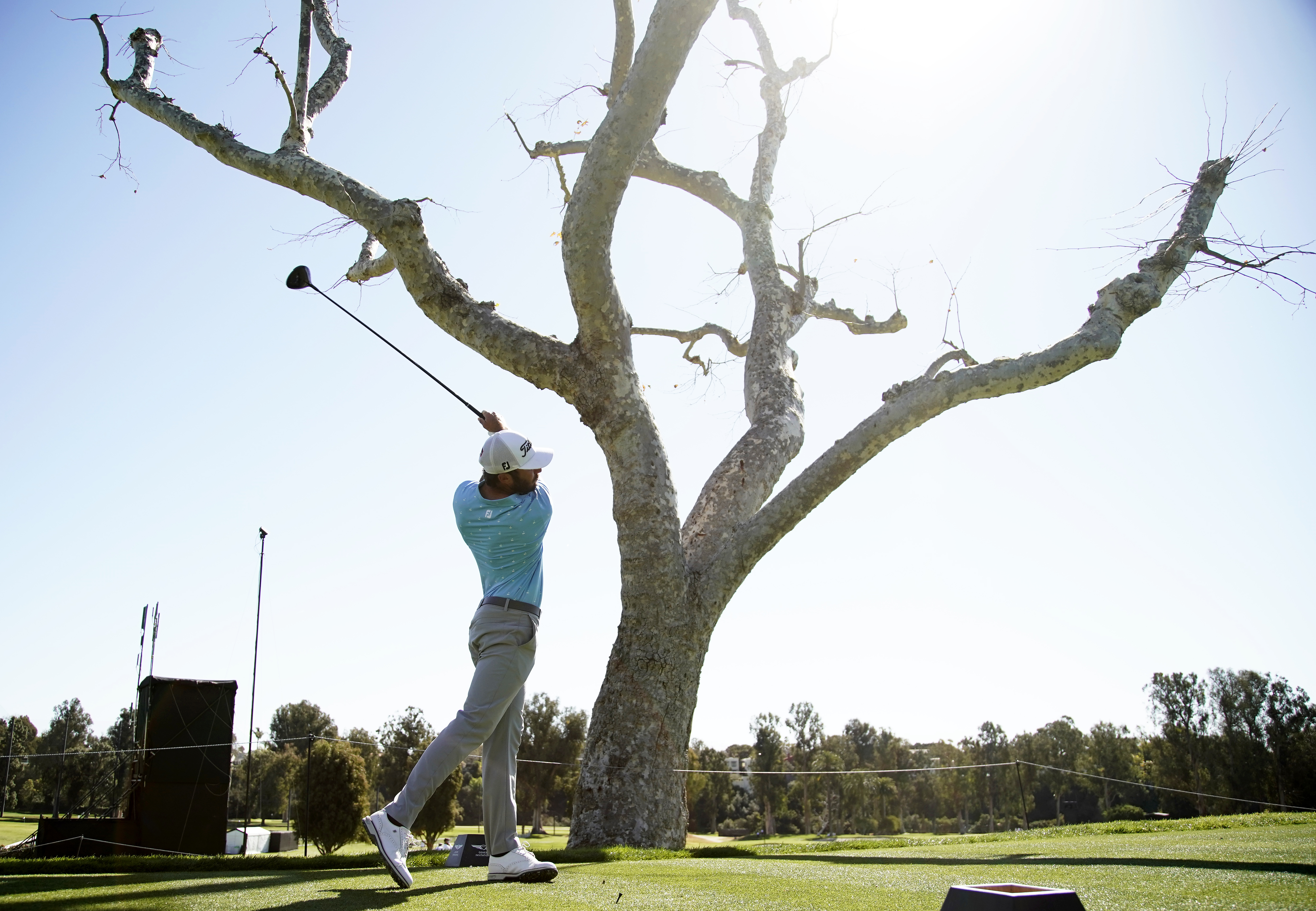 Max Homa tees off on the third hole during the final round of the Genesis Invitational golf tournament at Riviera Country Club, Sunday, Feb. 21, 2021, in the Pacific Palisades area of Los Angeles.