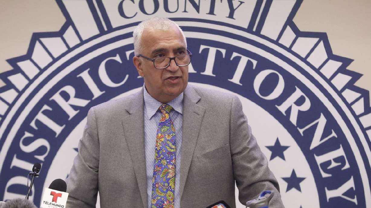 Salt Lake County District Attorney Sim Gill answers
questions during a press briefing at the district attorney’s office
building in Salt Lake City on Friday, Dec. 4, 2020. Gill says
Utah’s 2020 bail reform has changed things for the better in the
state’s most populous county.
