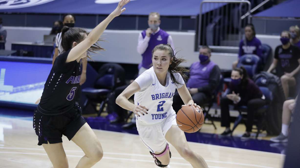 BYU guard Shaylee Gonzales drives against Portland during an NCAA women's basketball game, Saturday, Feb. 21, 2021 in Provo.