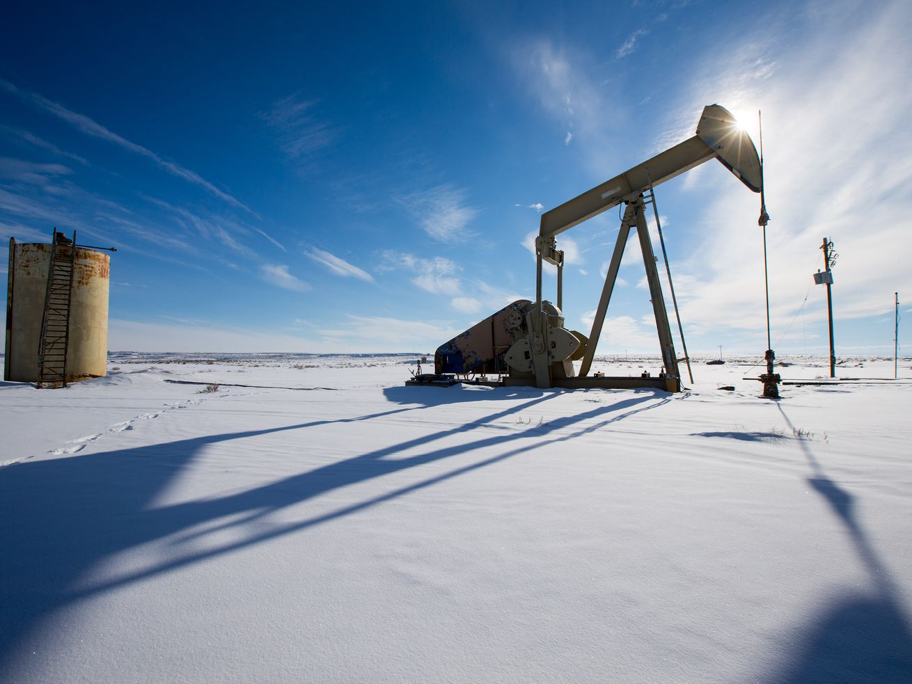 An oil pump sits idle near Ouray in Utah’s Uinta Basin.
Utah Gov. Spencer Cox joined 16 other GOP governors across the
country in urging President Joe Biden to rescind his executive
order banning any new leasing for oil and gas on federal public
lands
