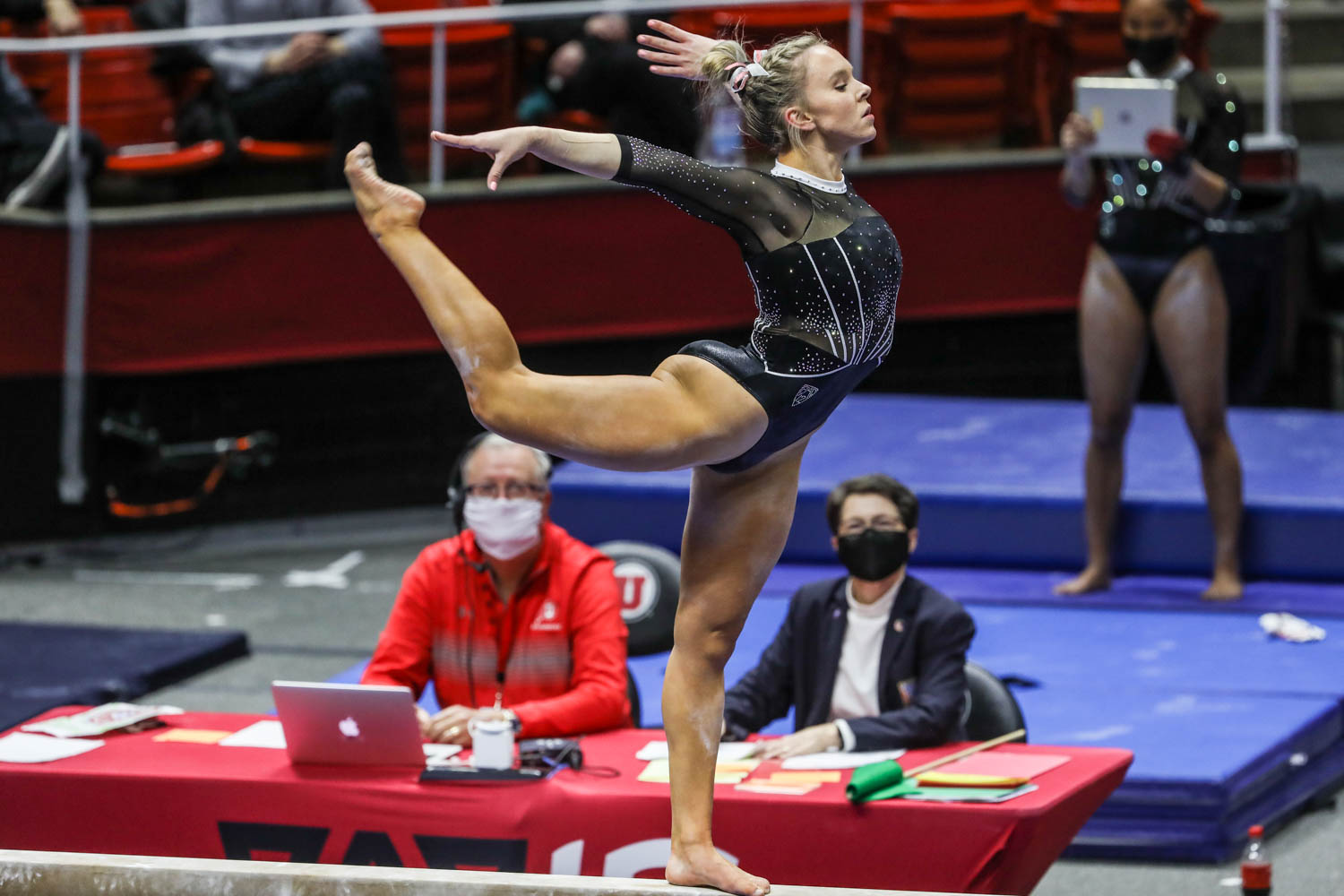 Utahâs Maile OâKeefe performs on the bars as Utah and UCLA compete in a gymnastics meet at the Huntsman Center in Salt Lake City on Friday, Feb. 19, 2021.