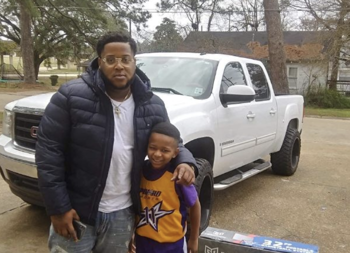 Stranger gifts new basketball hoop to boy who used trash can for practice